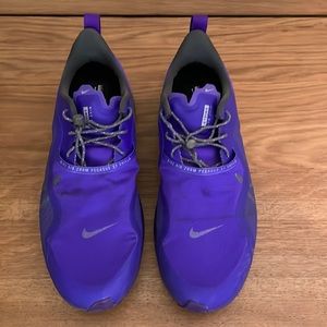 Men’s Nike run shield, so I 7.5. Purple. Worn once. Excellent condition